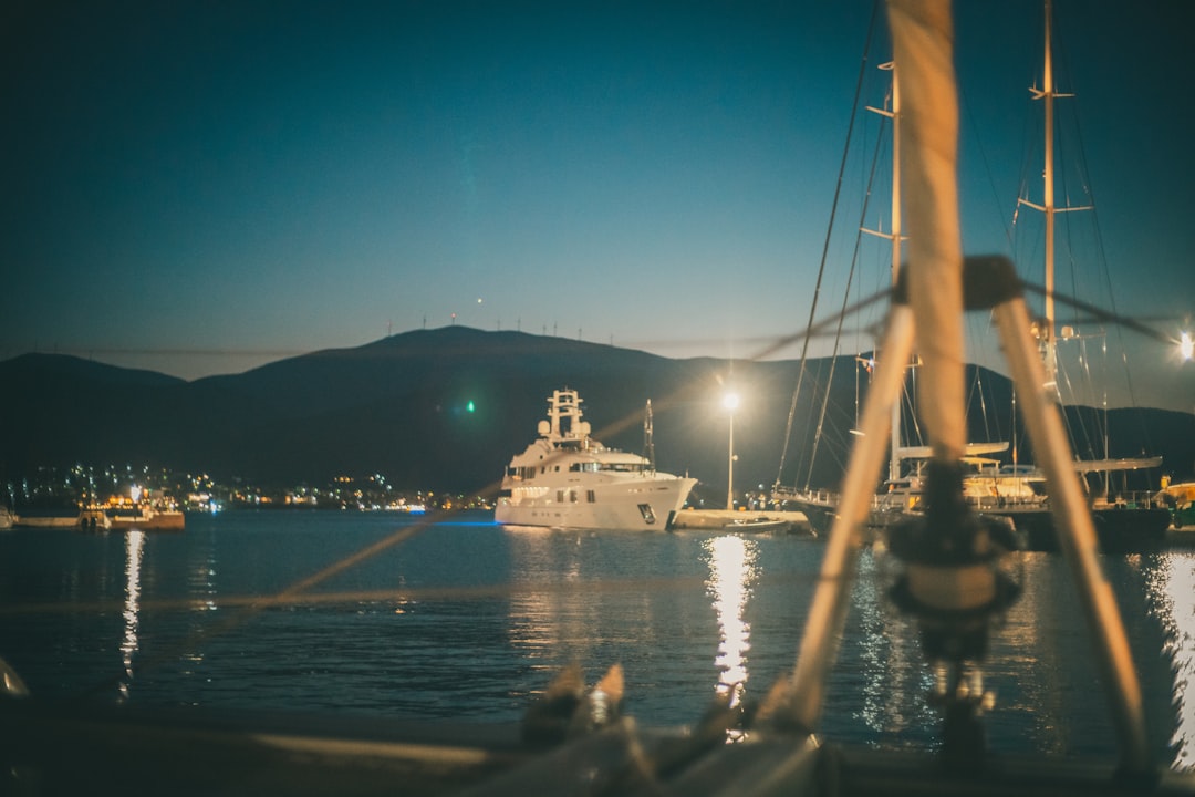 white ship on sea during daytime