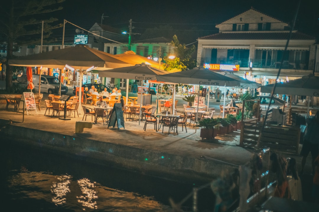 people walking on street during night time