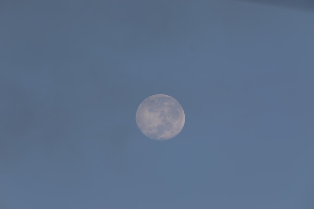 full moon in blue sky