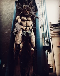 A large-scale outdoor sculpture blending natural materials with modern design.