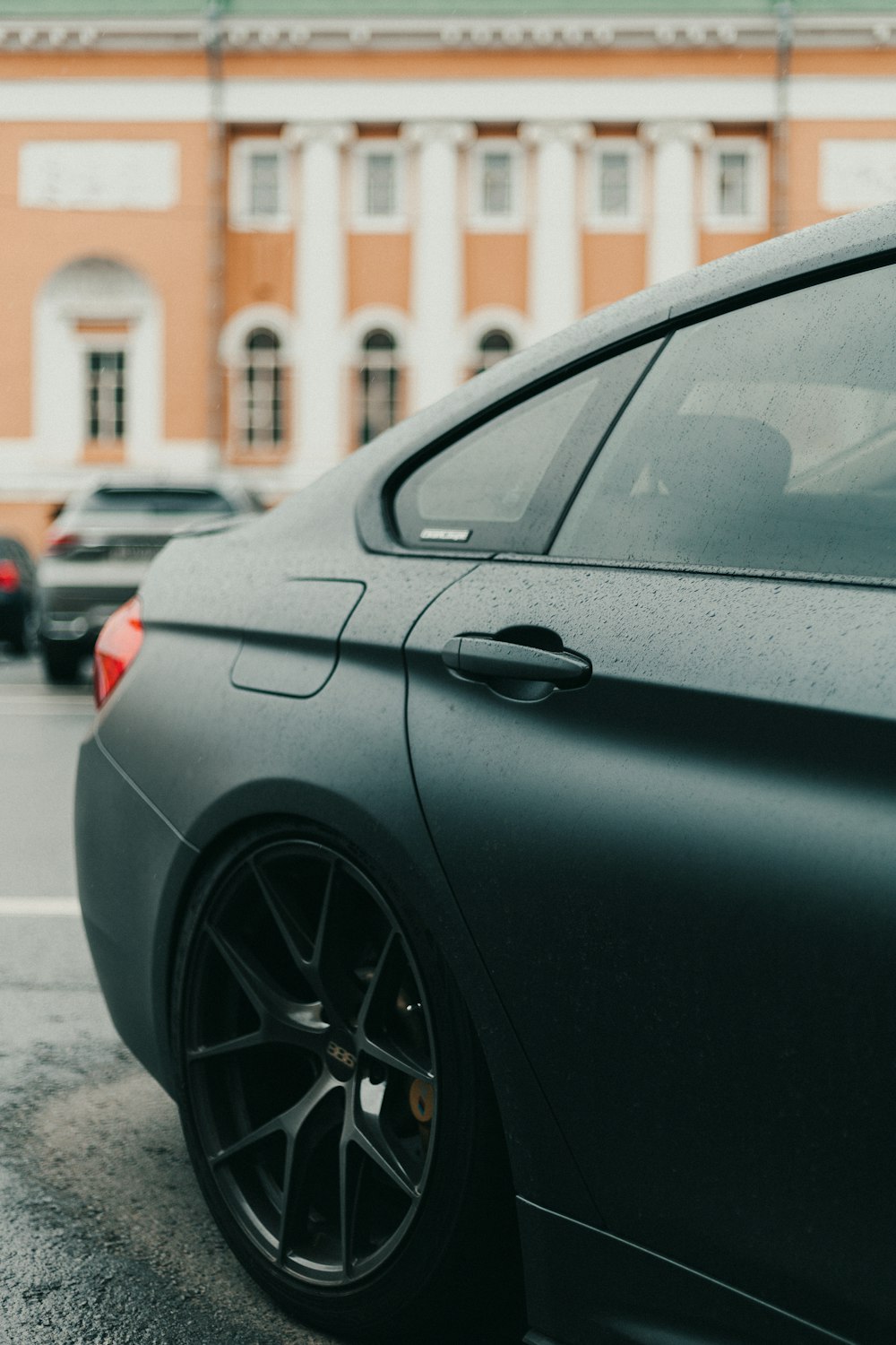 black car parked on the street during daytime