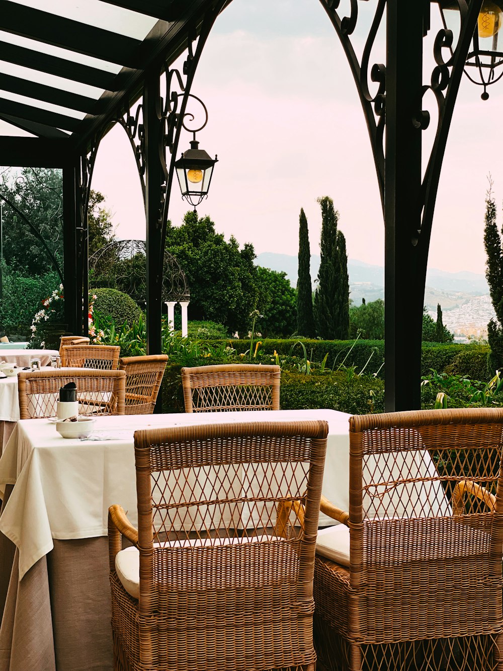 brown woven chairs and table