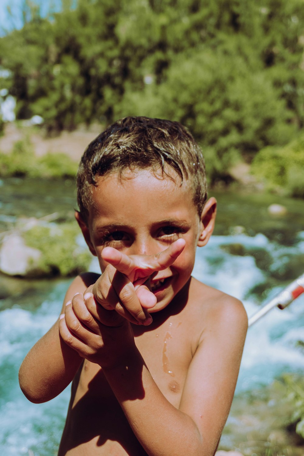 topless boy with red lipstick