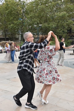 Participants dancing freely in an outdoor setting.