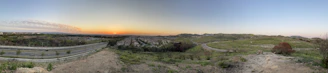 Panoramic view of a completed public infrastructure project at sunset with clear skies.