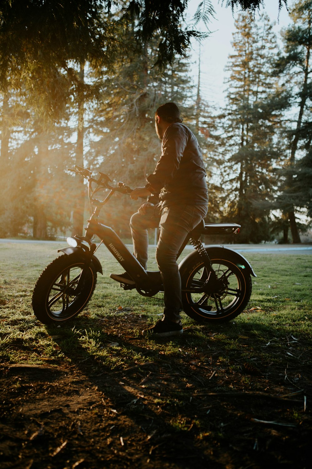 woman in brown jacket riding motorcycle during daytime