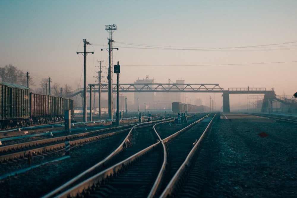 train rail near body of water during daytime