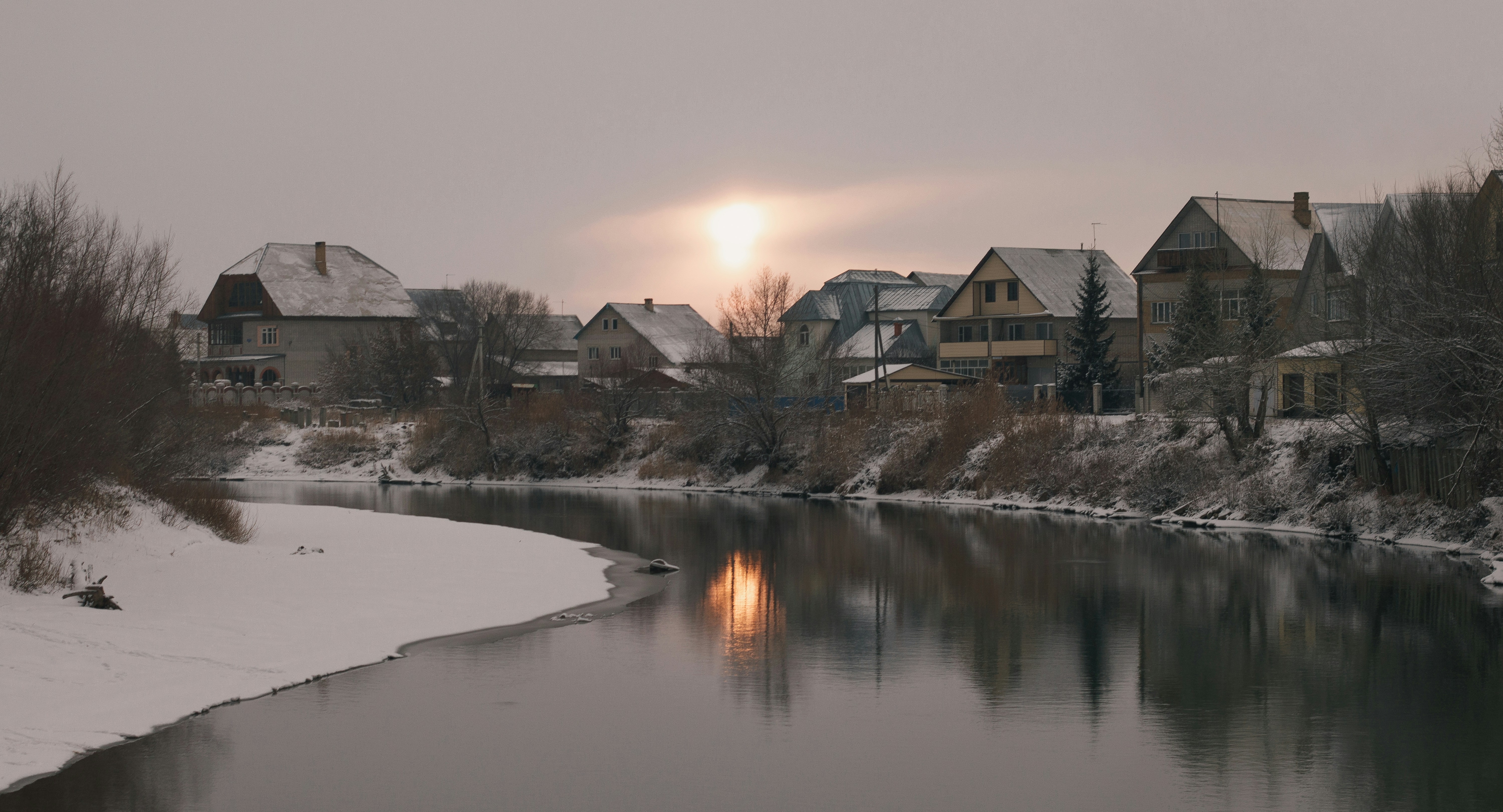 Brown and white house near body of water during daytime photo – Free ...