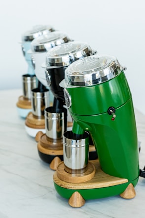 green and silver travel mug