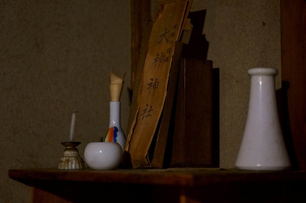 white and blue plastic bottle on brown wooden table