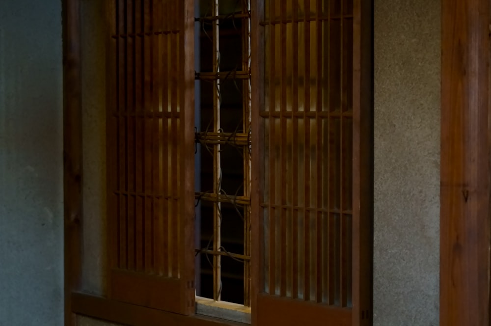 brown wooden framed glass window