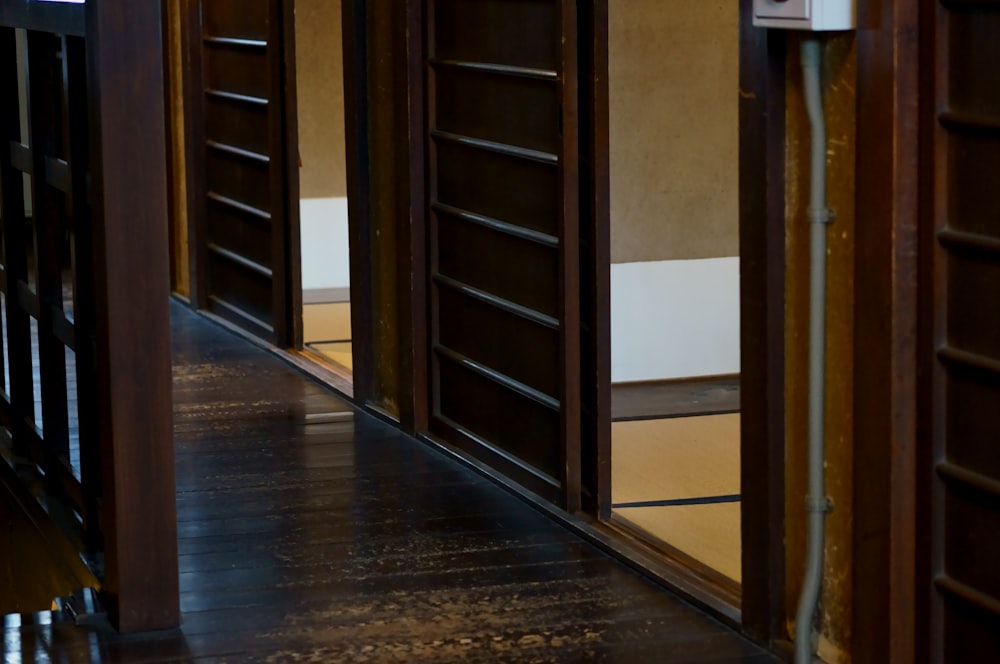 brown wooden framed glass door