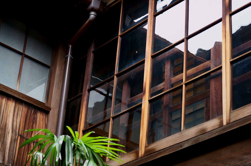 brown wooden framed glass window