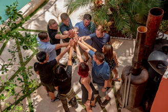 people standing on gray concrete stairs during daytime