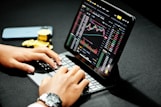 person using black laptop computer