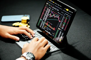 person using black laptop computer