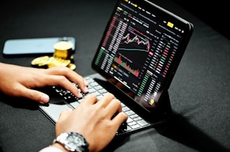 person using black laptop computer