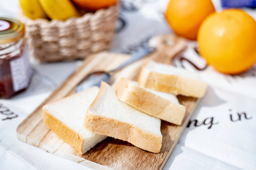 brown bread on brown wooden chopping board