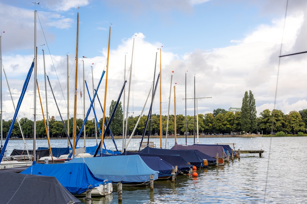 blue boat on body of water during daytime