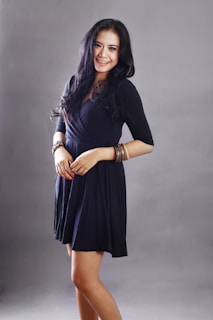 woman in black long sleeve dress
