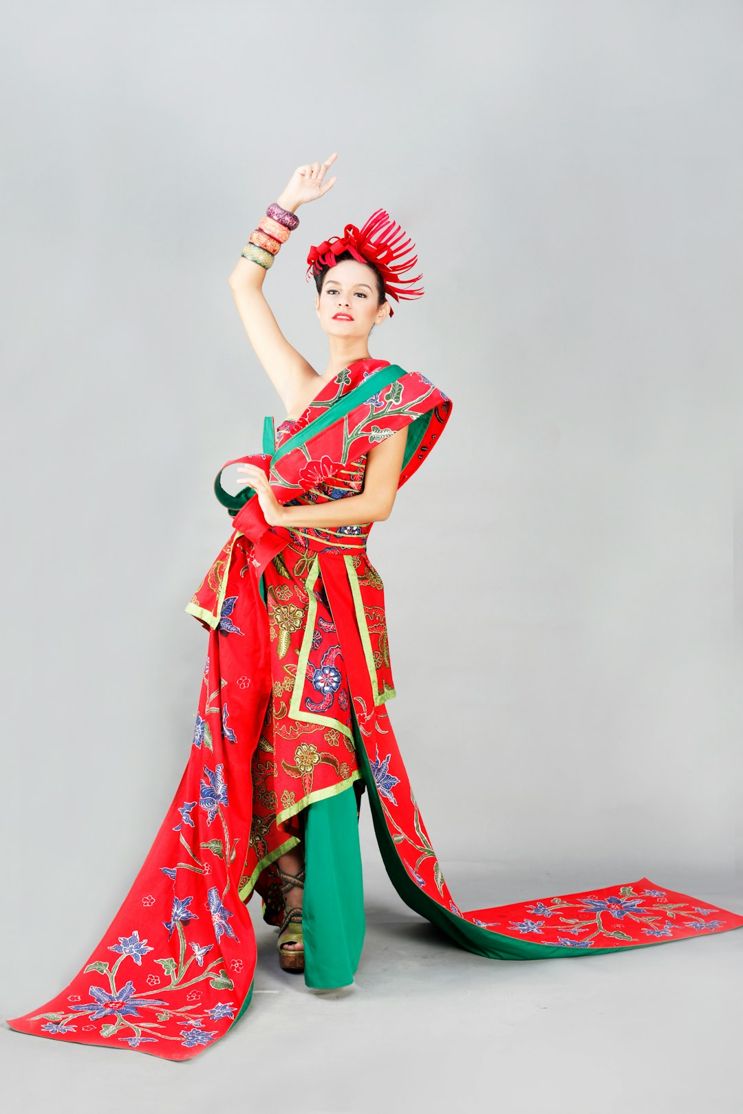 woman in red and white sari dress