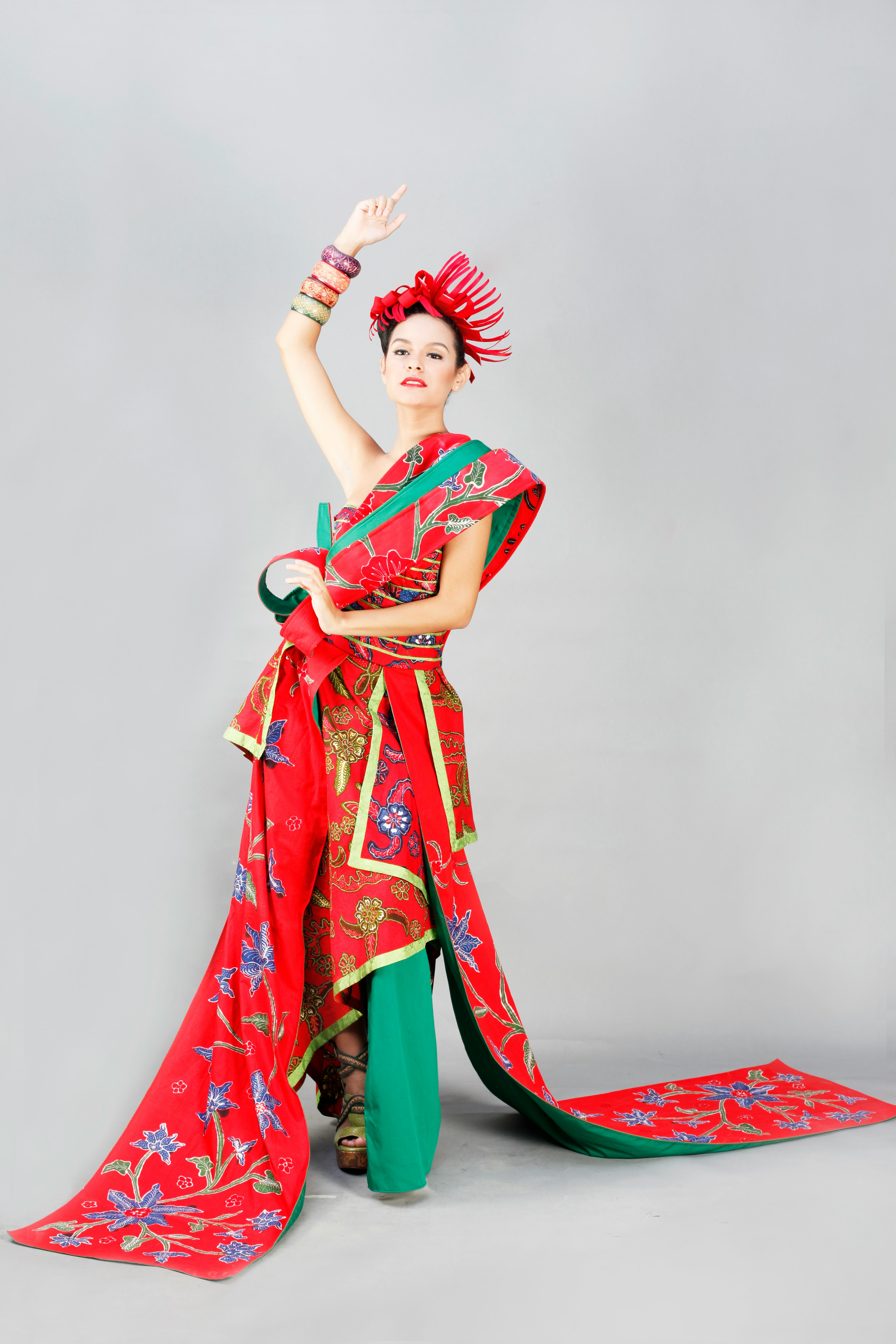 woman in red and white sari dress