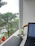 A confident Vietnamese businessman in a modern office setting.