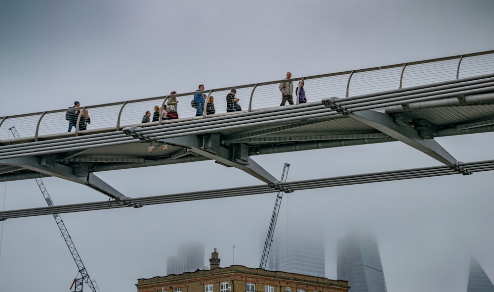 people on top of a building during daytime