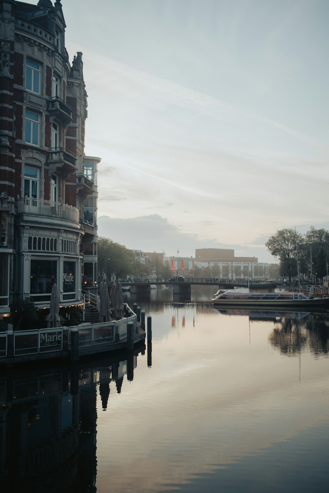 body of water between buildings during daytime