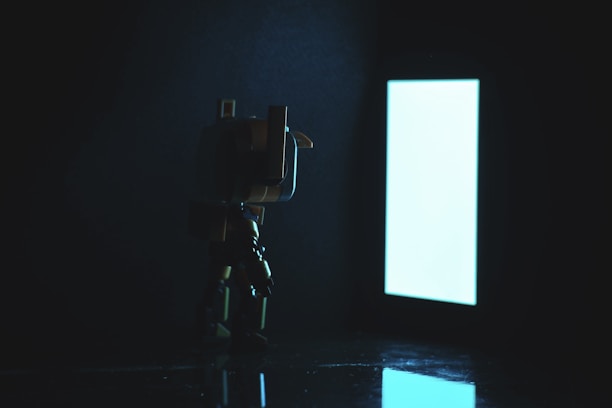 A beautifully staged shot of a 1:1 scale gaming statue bathed in soft, warm light.