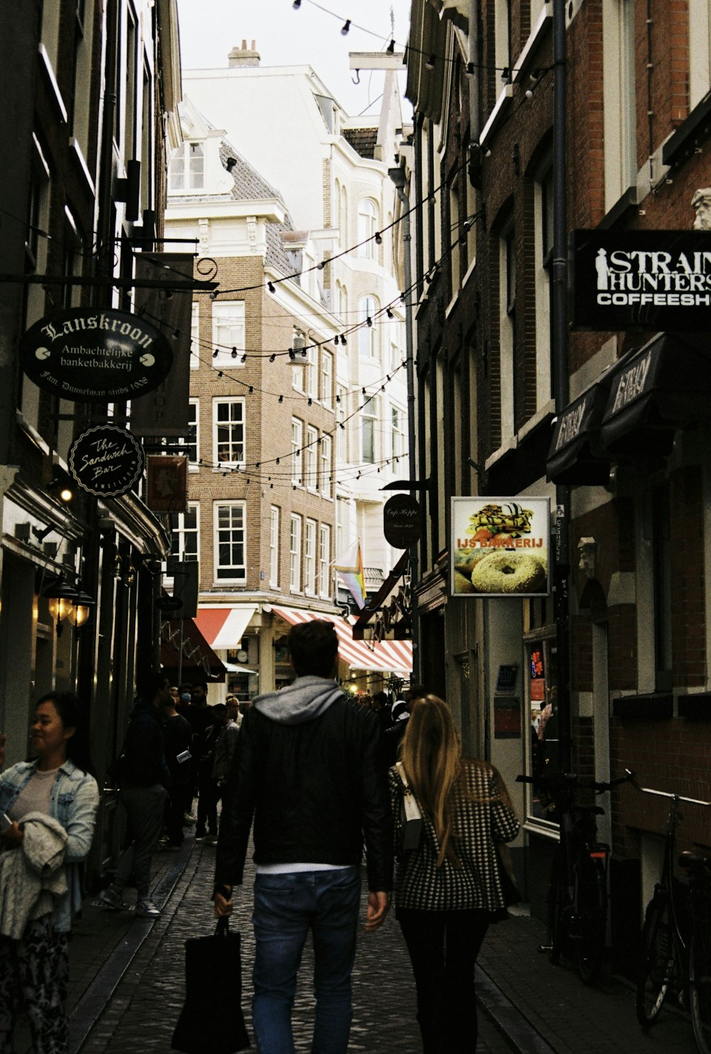 people walking on street during daytime