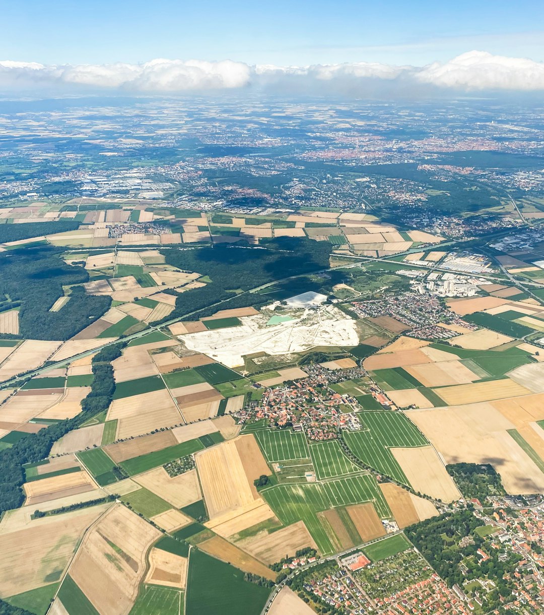 aerial view of green and brown field during daytime