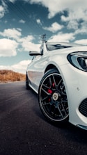 white porsche 911 on road during daytime