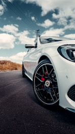 white porsche 911 on road during daytime