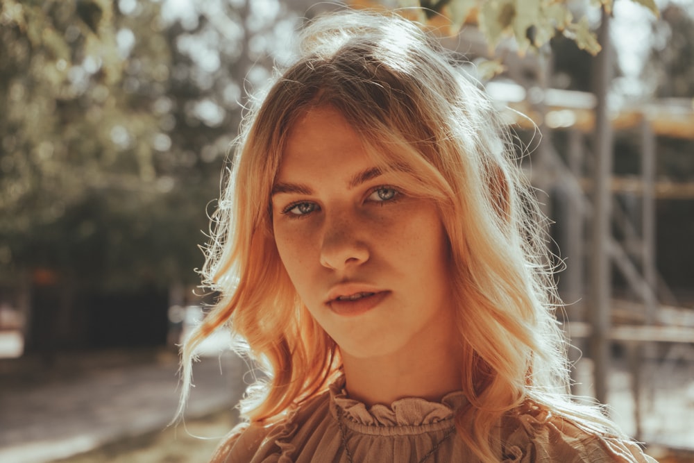 woman in brown turtleneck shirt