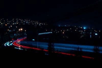 time lapse photography of cars on road during night time