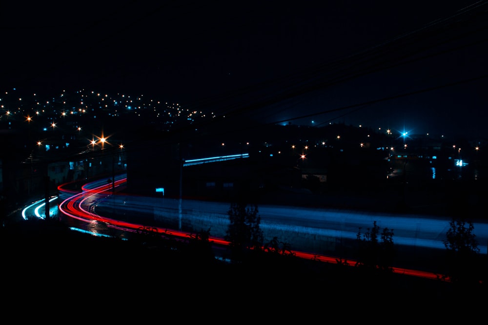 time lapse photography of cars on road during night time