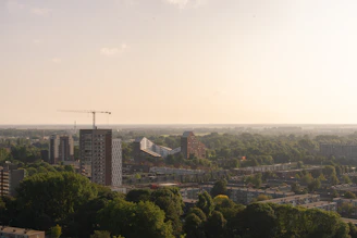 A panoramic view of Vientiane’s skyline at sunset, highlighting economic growth.