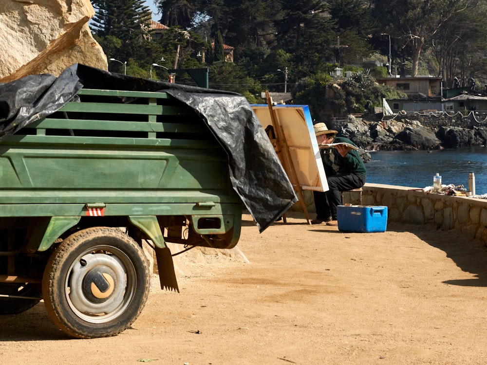 green and brown utility truck