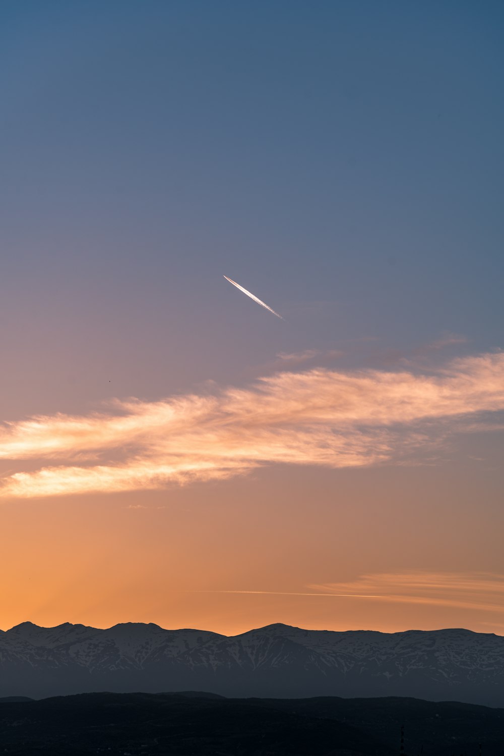 silhouette of mountain during sunset