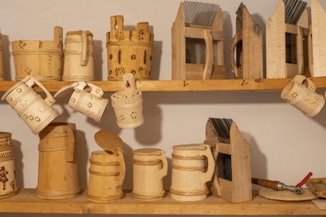 a shelf filled with lots of wooden objects
