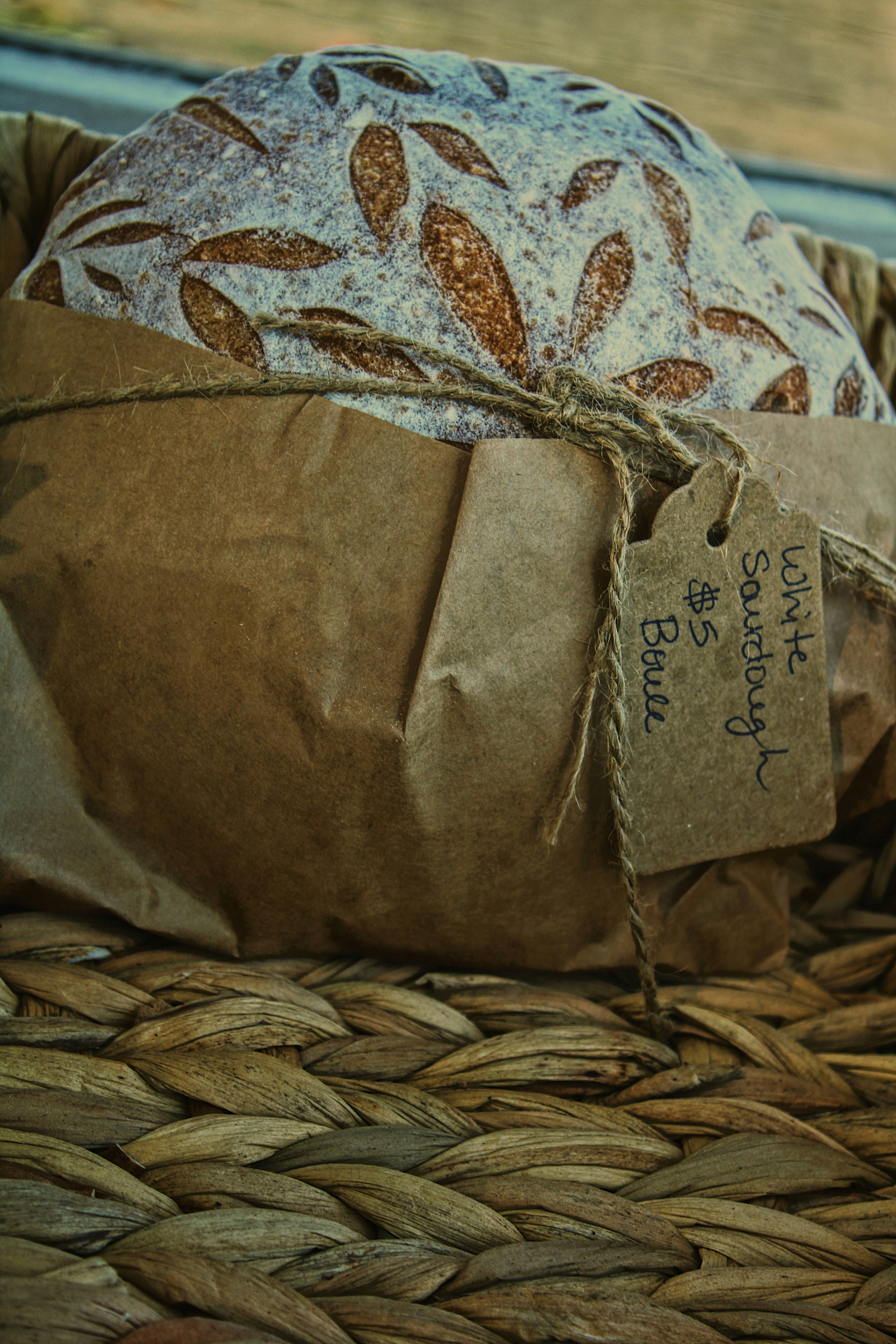 brown paper bag on brown woven basket