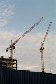 brown crane under blue sky during daytime