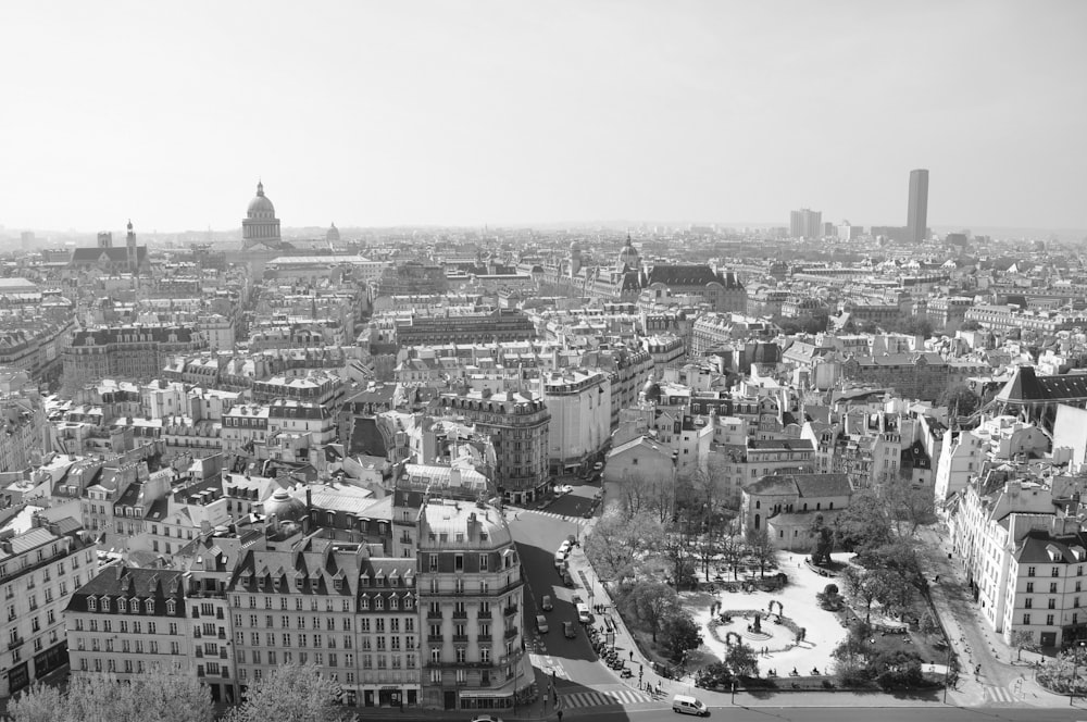 grayscale photo of city buildings