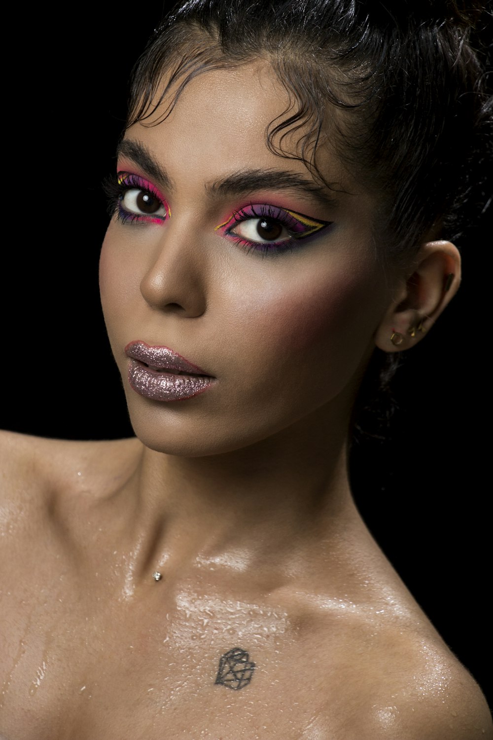 woman with red lipstick and black mascara