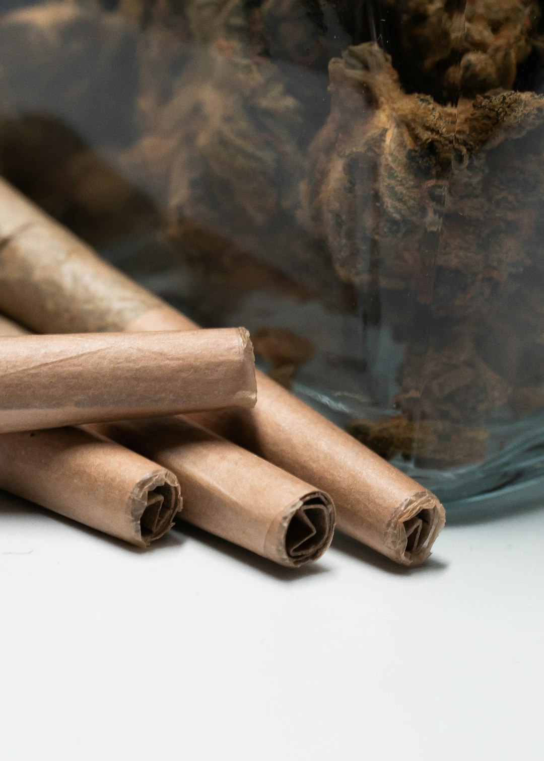 brown wooden sticks on blue and white textile