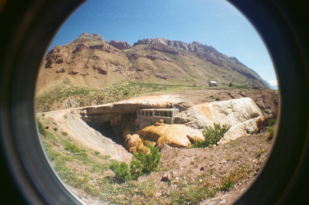 brown rocky mountain under blue sky during daytime