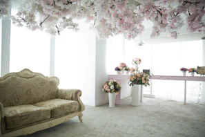 A serene bohemian-style room decorated with floraja’s floral prints and bright pastel cushions