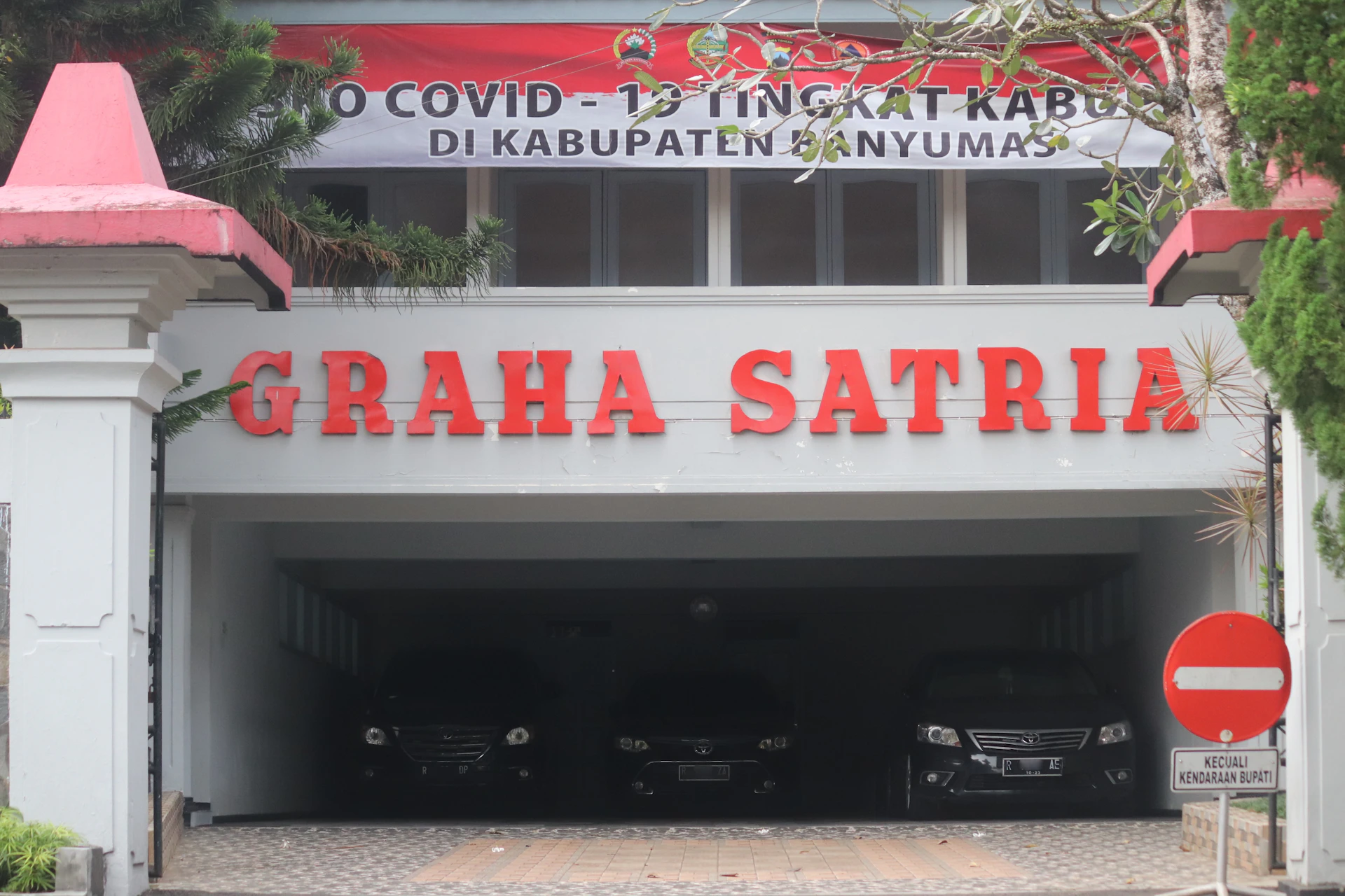 woman wearing yellow long-sleeved dress under white clouds and blue sky during daytime