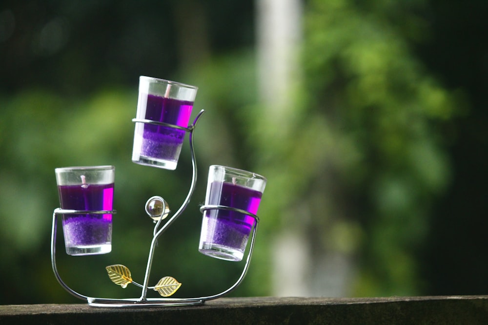 purple and white drinking glasses